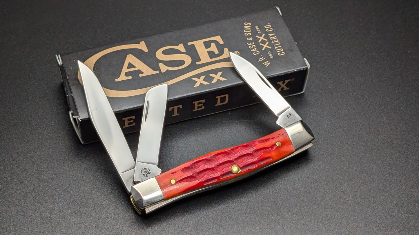 Case Indian Paint Brush Bone Kinfolks Jig Medium Stockman Model #42321 Pattern (63032 SS) Open back on a drak gray surface