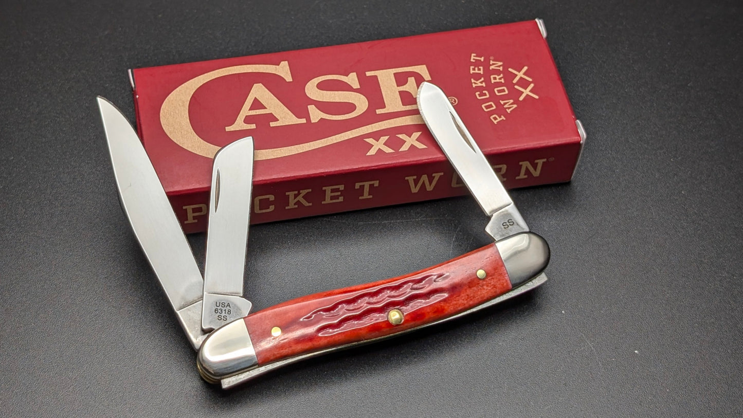 Case Pocket Worn Old Red Bone Corn Cob Jig Medium Stockman Model #00786 Pattern (6318 SS) Back Open with box on gray surface