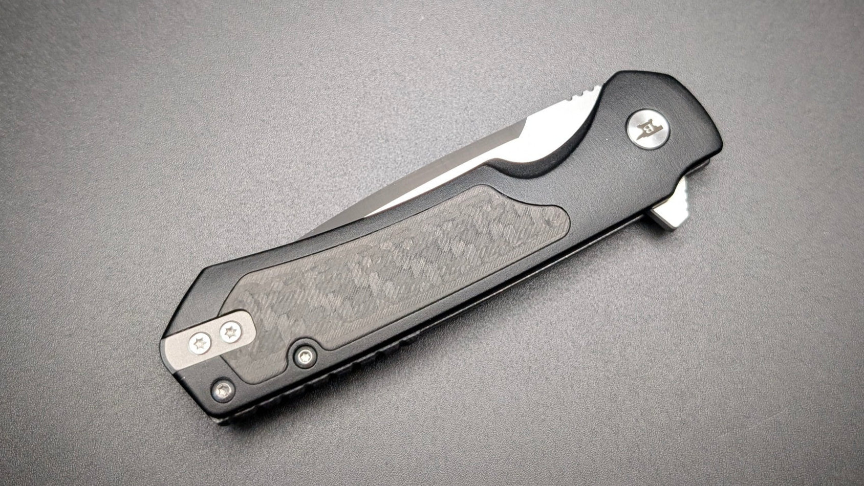 Buck 714 Black with aluminum Handle and Carbon Fiber inserts