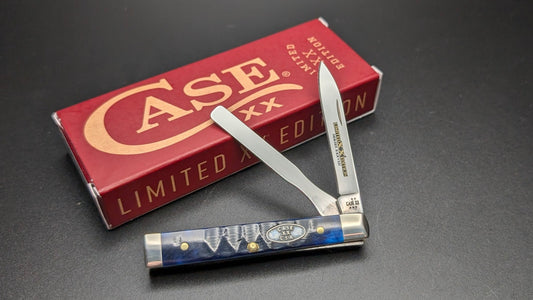 Case knife with a red box on a dark surface