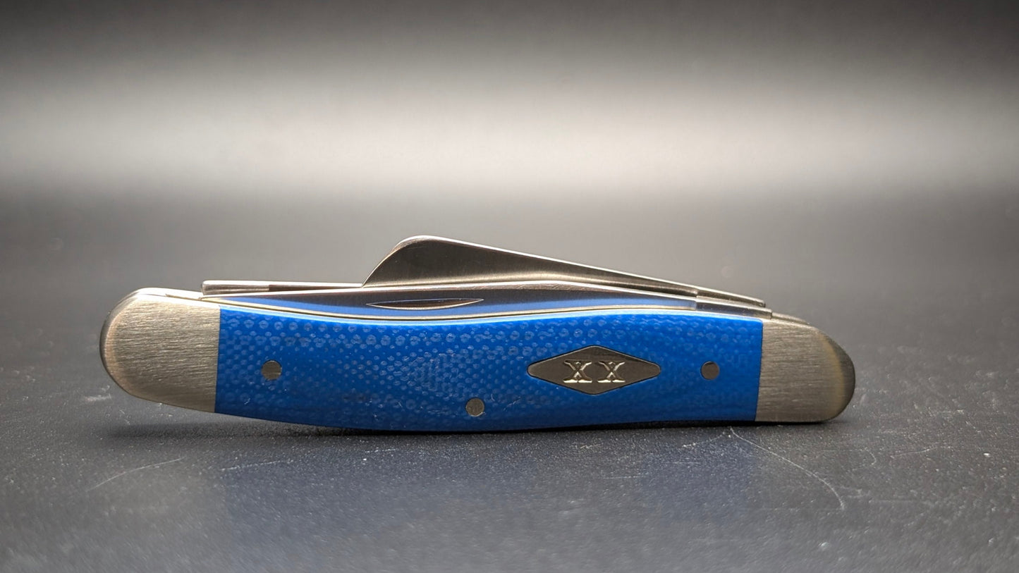 Case Blue G10 Smooth Medium Stockman Model #16752 Pattern (10318 SS) Closed Front on gray surface