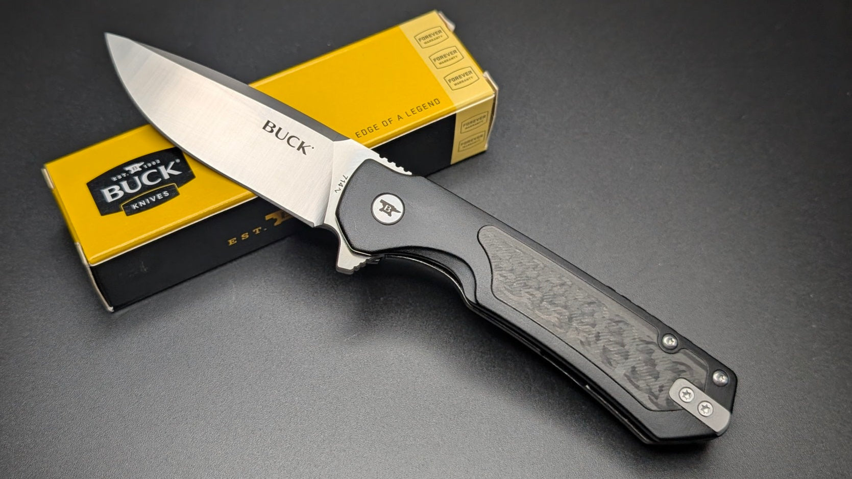 Buck 714 Black with aluminum Handle and Carbon Fiber inserts