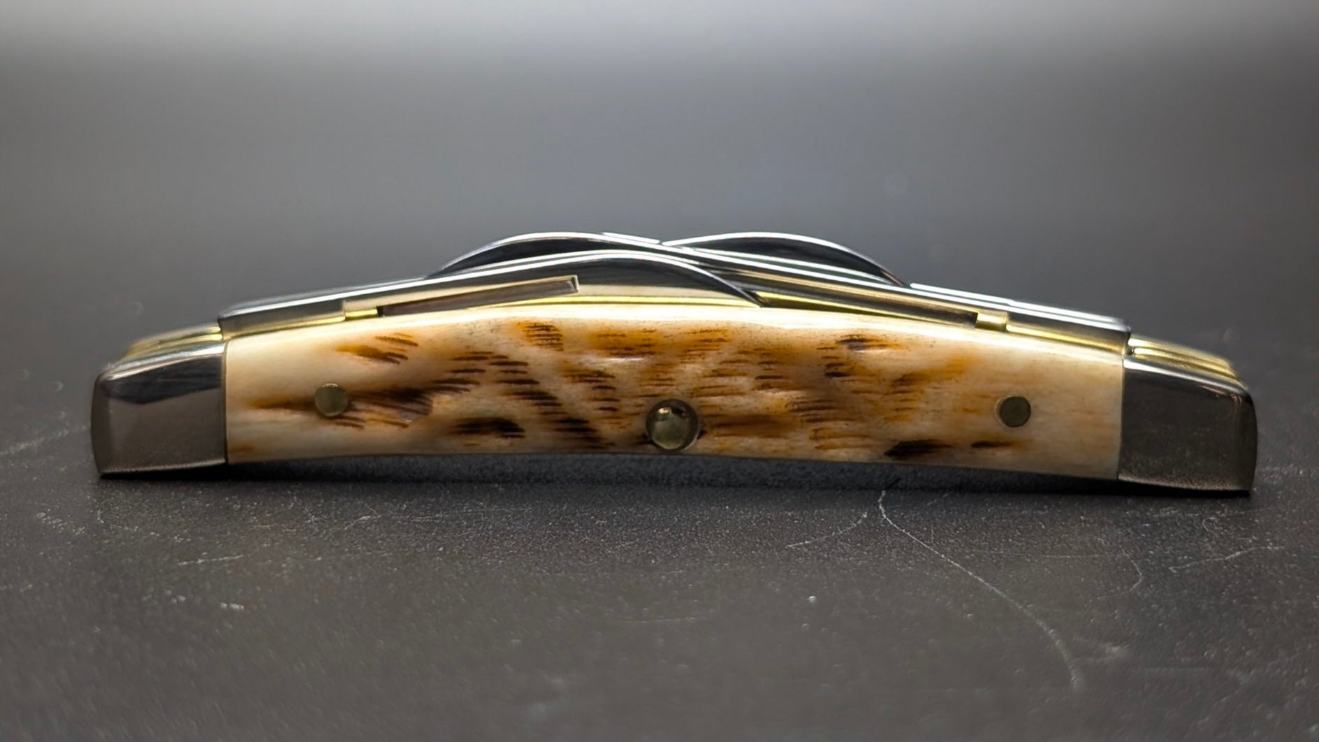 Case Small Congress Amber Bone Peach Seed Jig Model # 10723 Pattern (6468 SS)