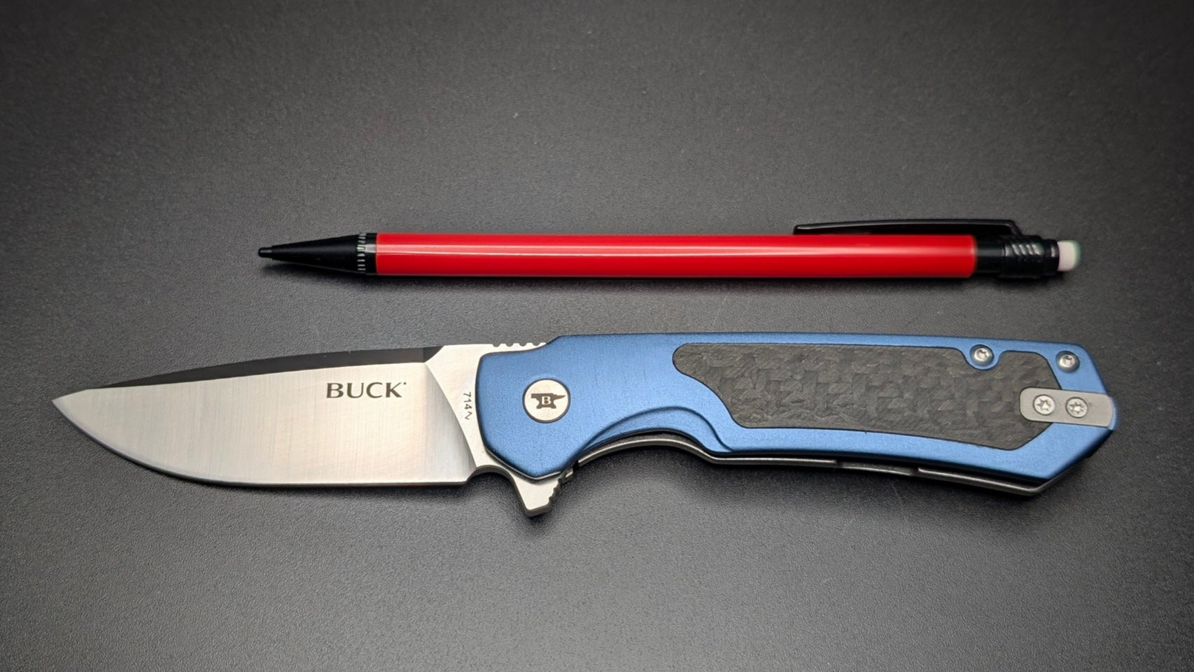 Buck 714 Blue with aluminum Handle and Carbon Fiber inserts