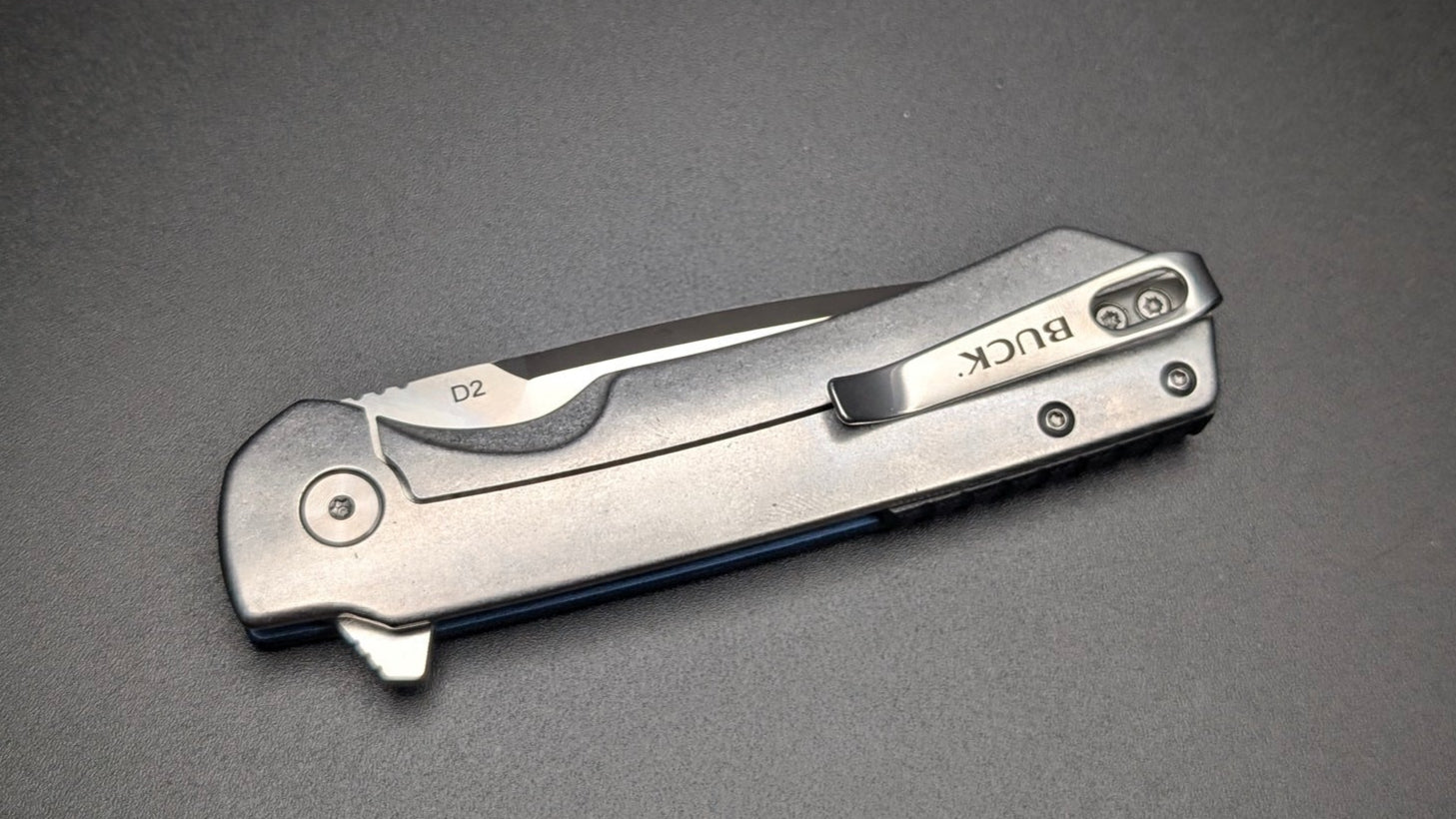 Buck 714 Blue with aluminum Handle and Carbon Fiber inserts