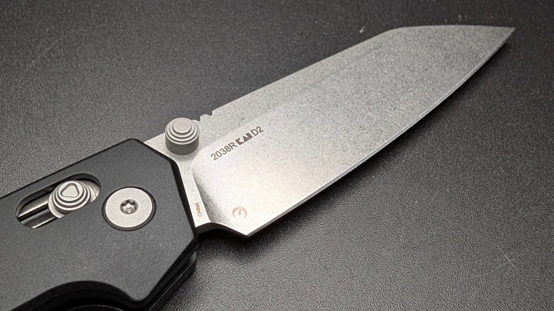 Folding knife on a black background