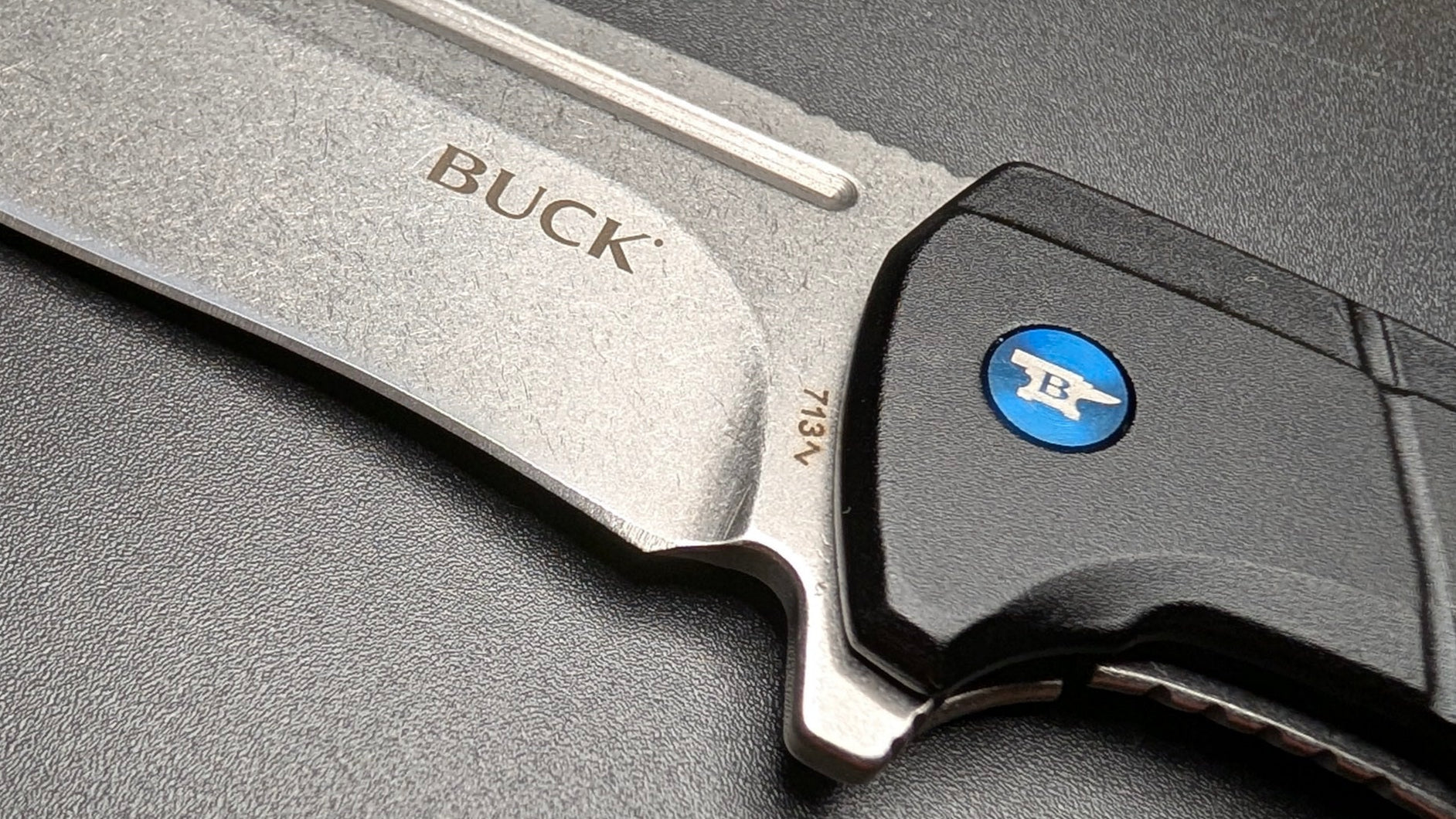 Buck 713 Ruckus Black and Blue aluminum handle and Satin Blade
