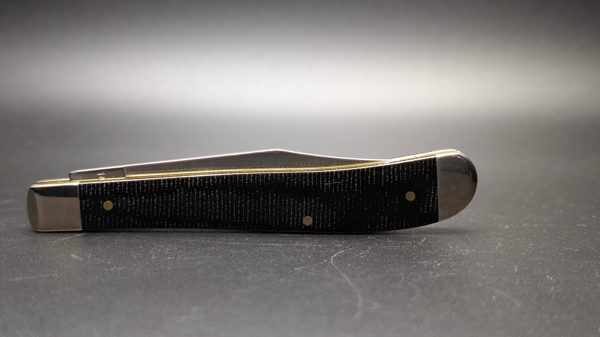 Case Slimline Trapper Black Canvas Laminate Model #23135 Pattern (101046 SS) Closed Back