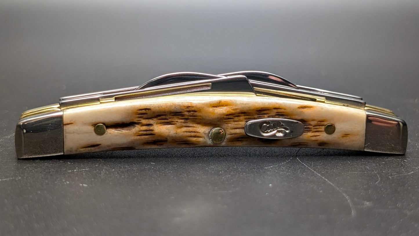 Case Small Congress Amber Bone Peach Seed Jig Model # 10723 Pattern (6468 SS)