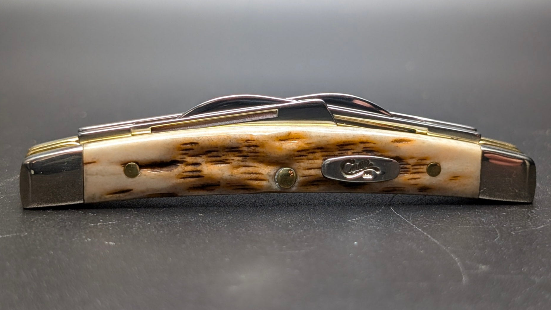 Case Small Congress Amber Bone Peach Seed Jig Model # 10723 Pattern (6468 SS)