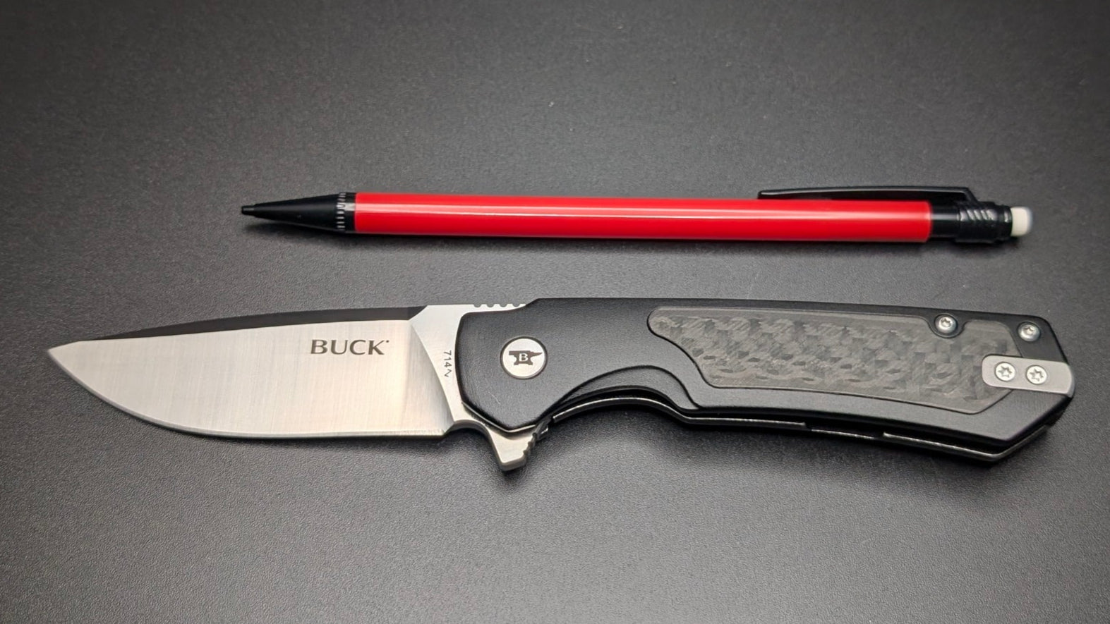 Buck 714 Black with aluminum Handle and Carbon Fiber inserts